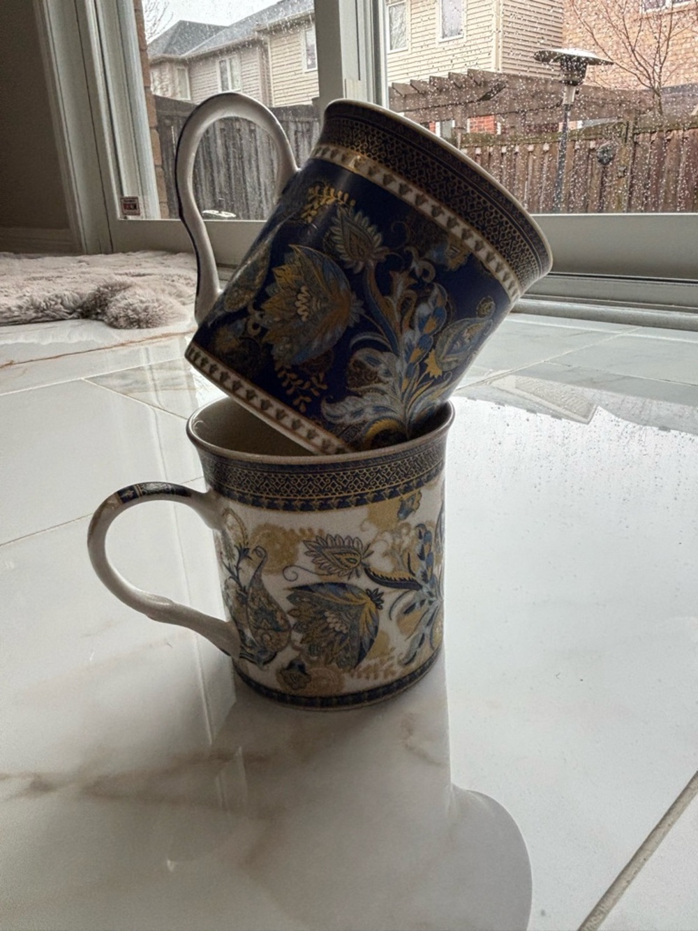 Elegant Blue and White Paisley Porcelain Mugs - Set of 2